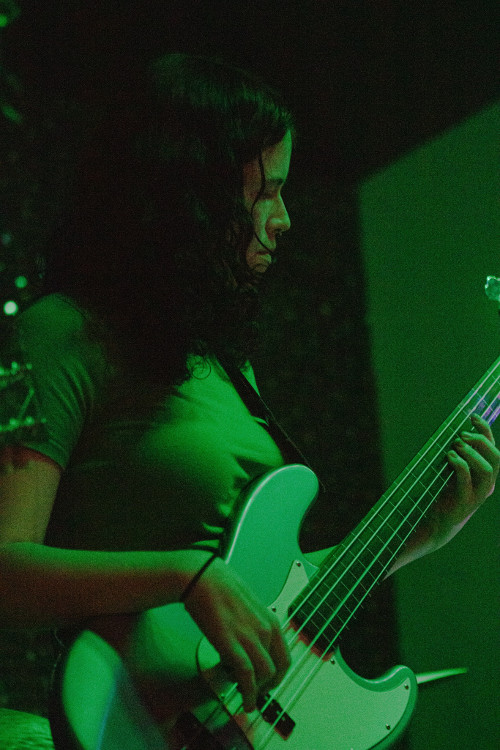 Isabel Zweig playing an electric bass