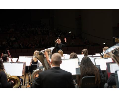 Dr. Serena Weren conducting the Loyola Band