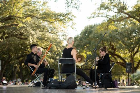 Loyola Faculty performing at Music Under the Oaks