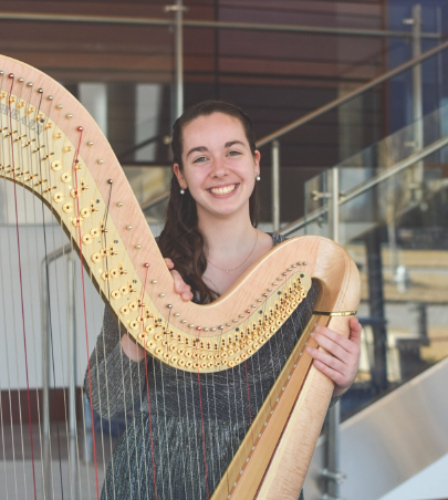 Margaret Anne Altagen Posing with a Harp